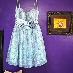 Homecoming or special occasion dress. B.Smart junior size 7. Light bluish gray.